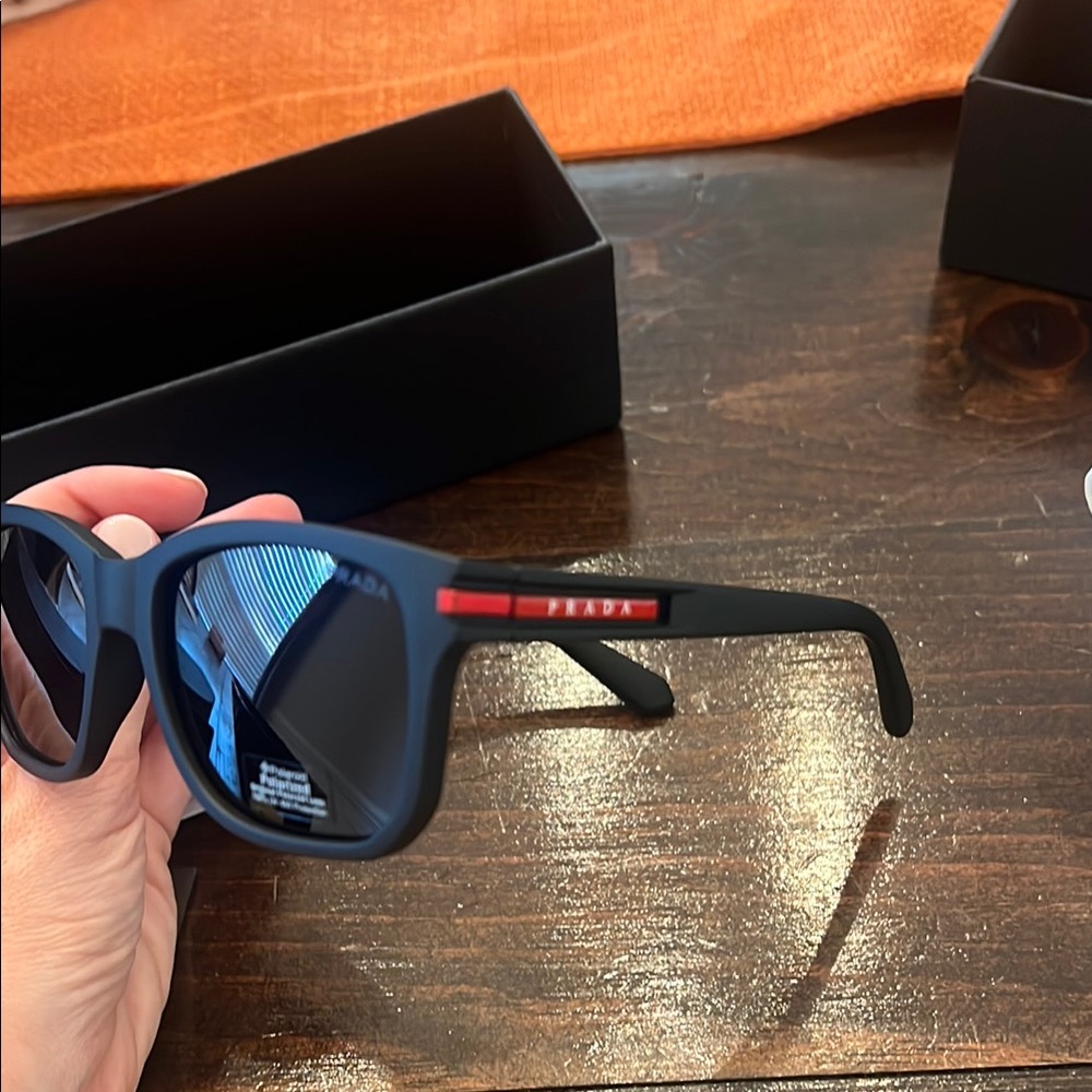 Prada Black Sunglasses with Red Accent